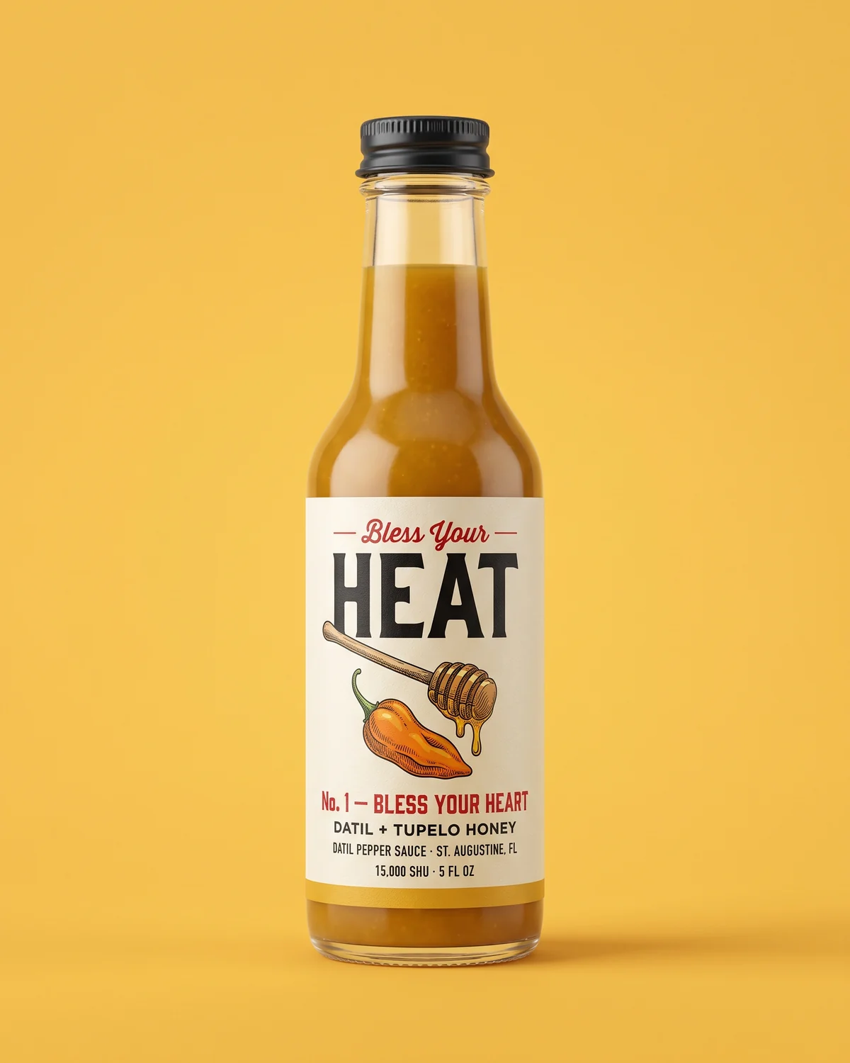 Bless Your Heart bottle — golden datil and tupelo honey sauce on a butter-yellow field.